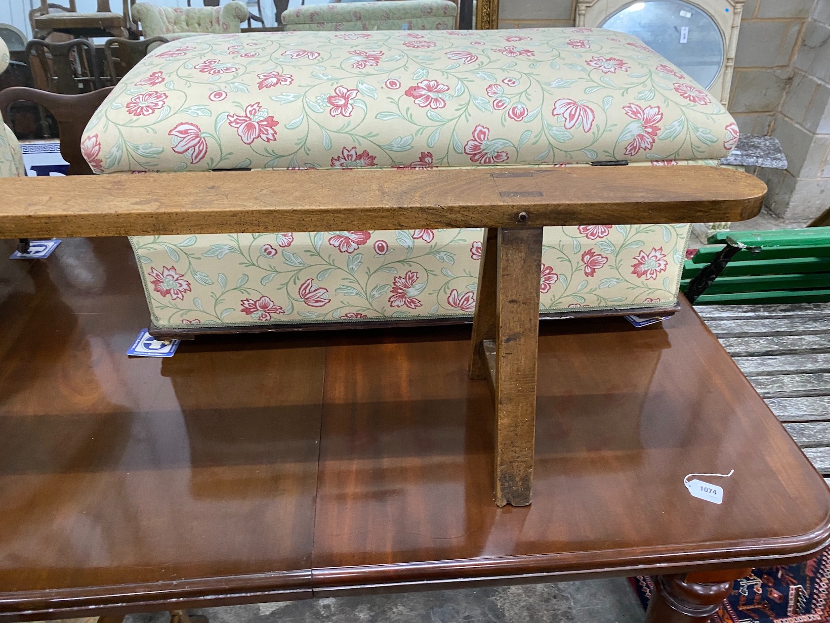 A late 18th / early 19th century provincial fruitwood bench seat, length 254cm, height 46cm